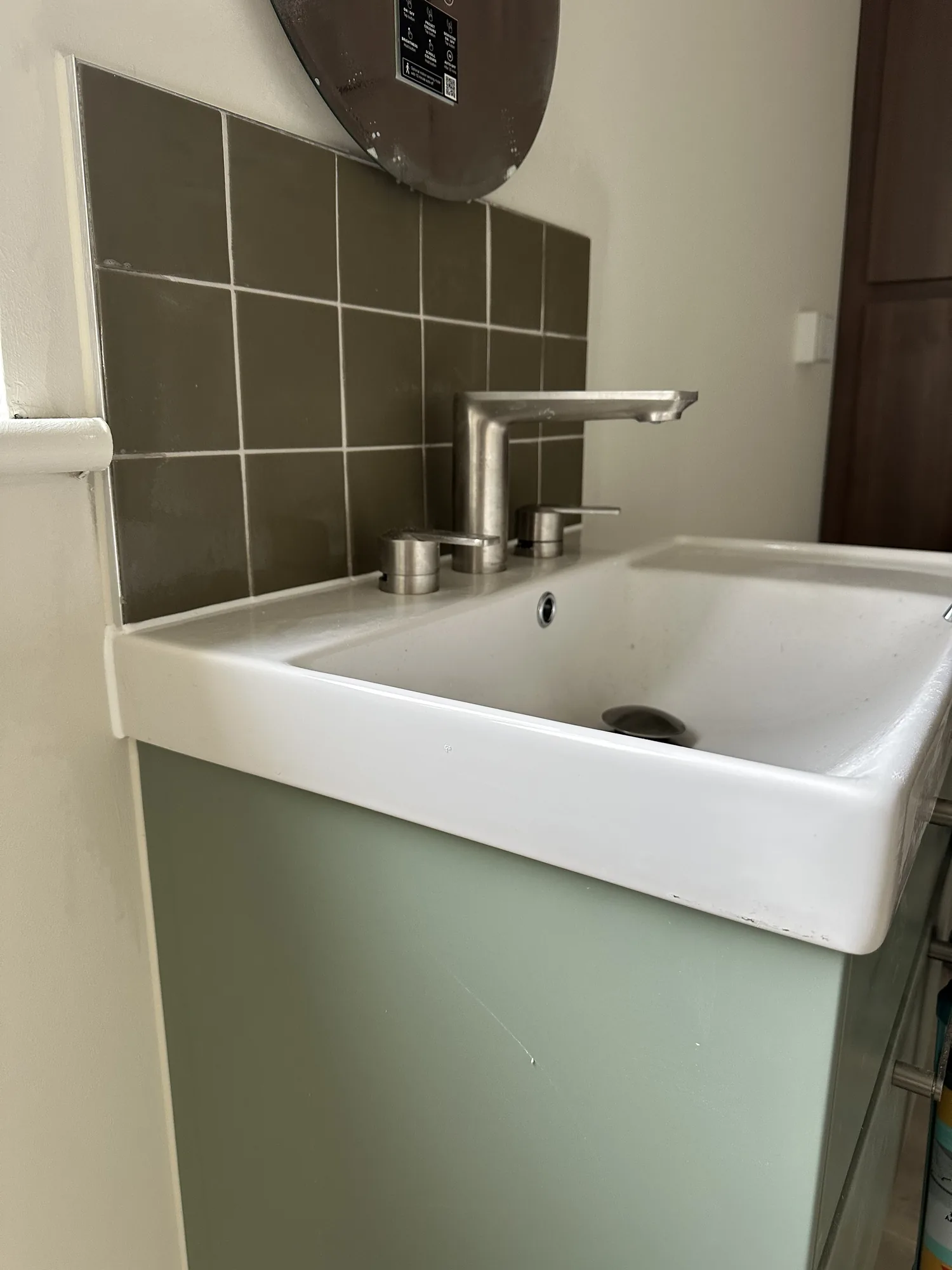 Sealed basin and tiled wall by Bristol Sealants
